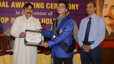 Students and officials at the Board of Intermediate and Secondary Education Lahore position award ceremony
