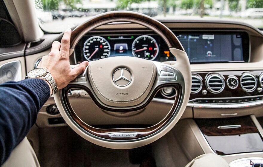 A driver at the wheel of a car