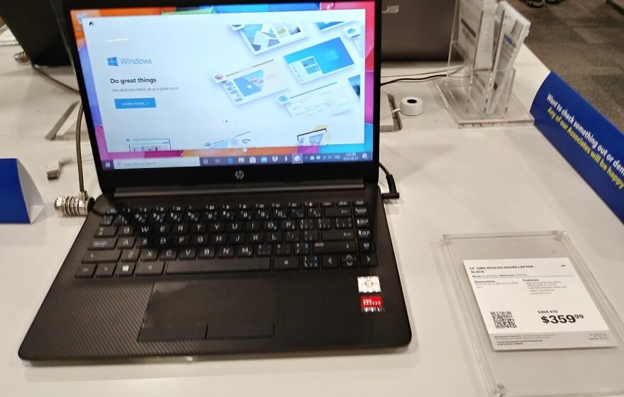 A laptop on display in an electronics store