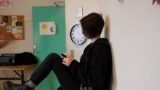 A teenager using a mobile phone