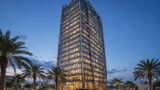 Modern Islamic bank headquarters tower at dusk.