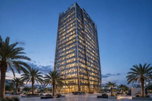 Modern Islamic bank headquarters tower at dusk.