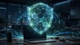 Digital shield protecting a laptop, symbolizing cybersecurity in Pakistan